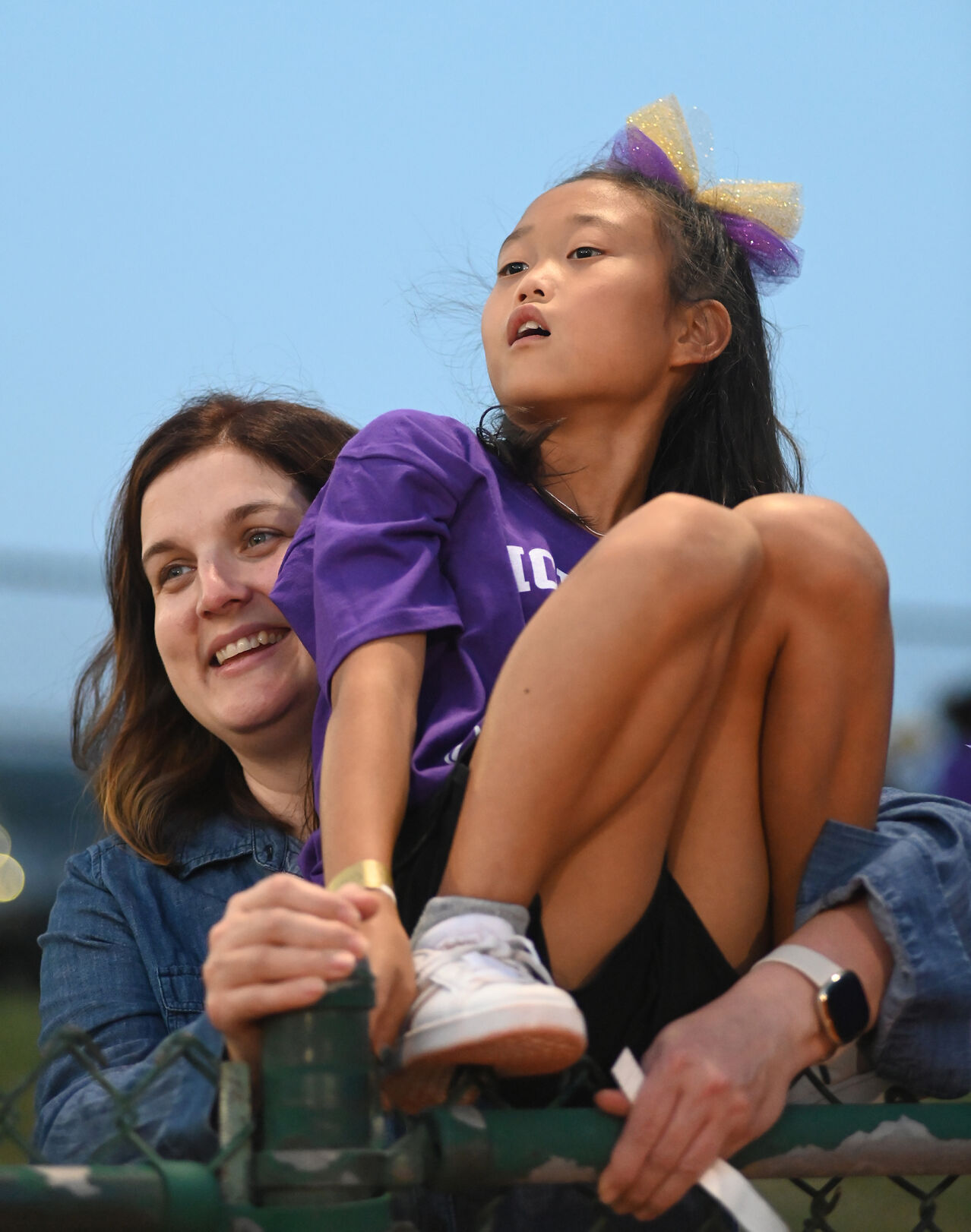 Lisa Brennaman holds her daughter, Lucy Brennaman